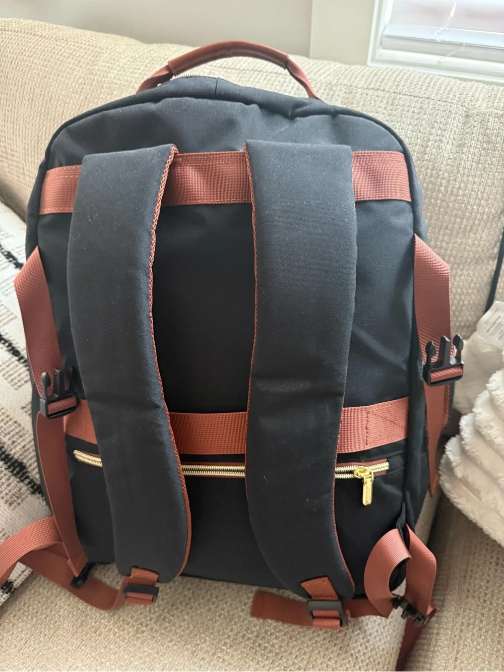 Black and Brown Men's Backpack with Gold Hardware